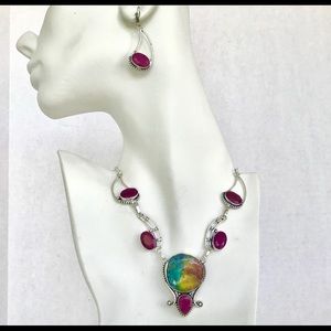 RAINBOW SOLAR QUARTZ DRUZY, RUBY SET. 925 SILVER.